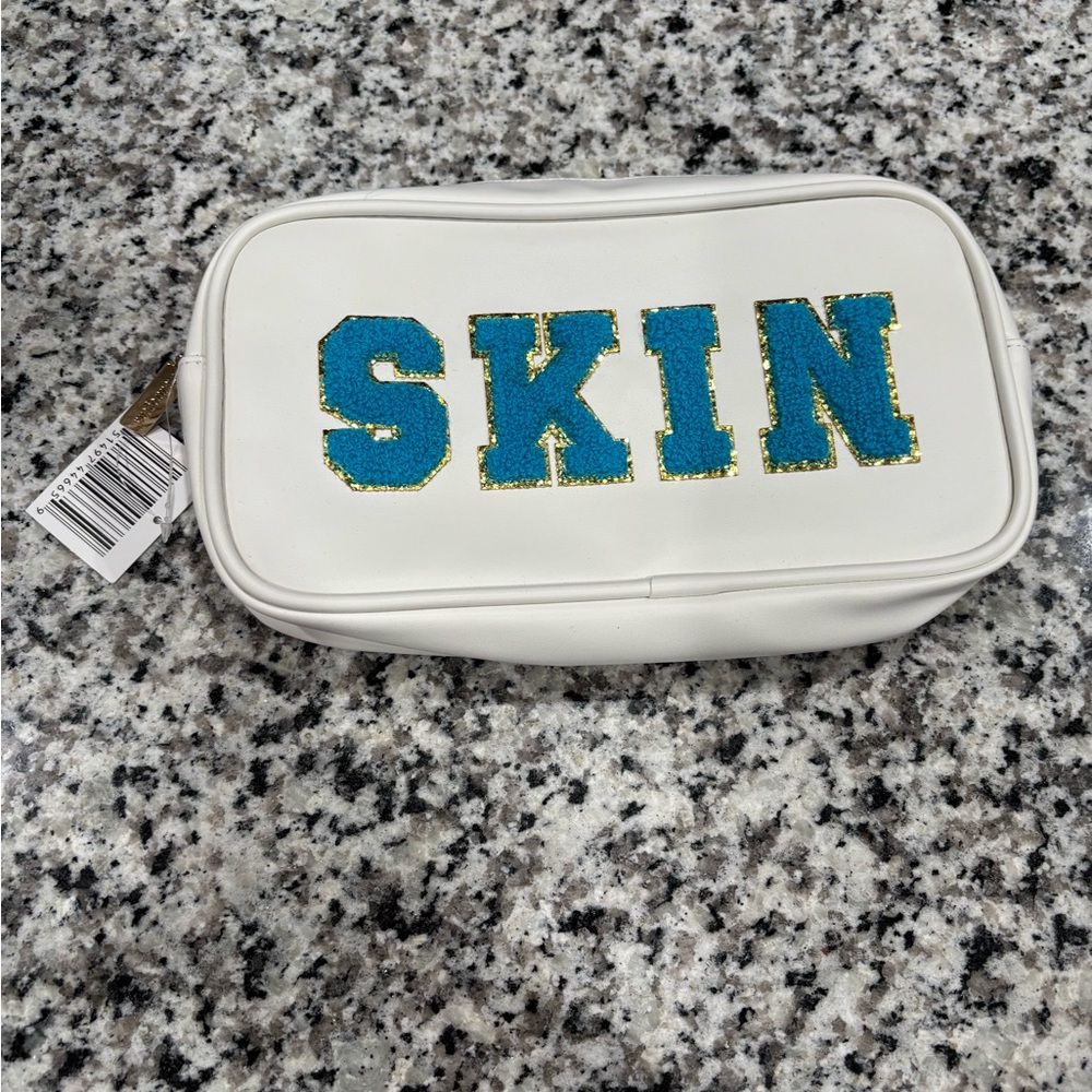 White Pouch with Blue and Gold 'SKIN' Design - Picture 8 of 9